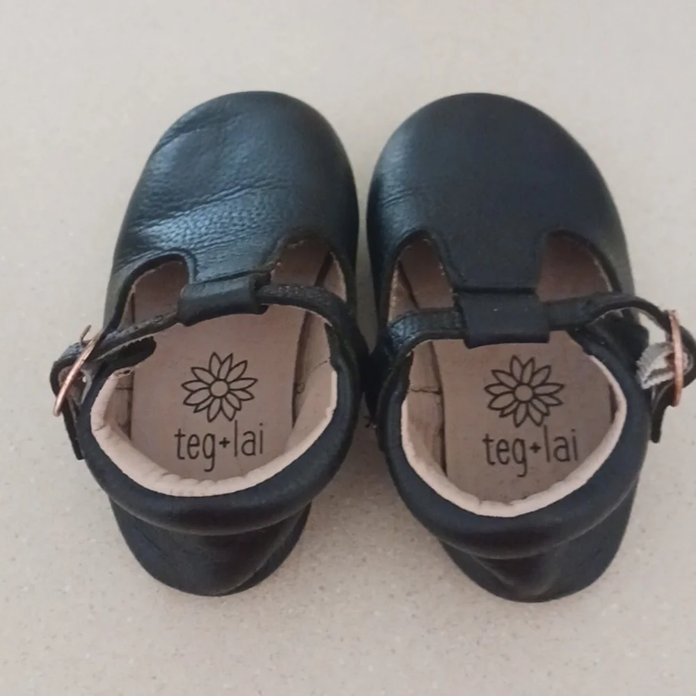 Teg+Lai  T Strap Black Rubber Flex Sole Shoes